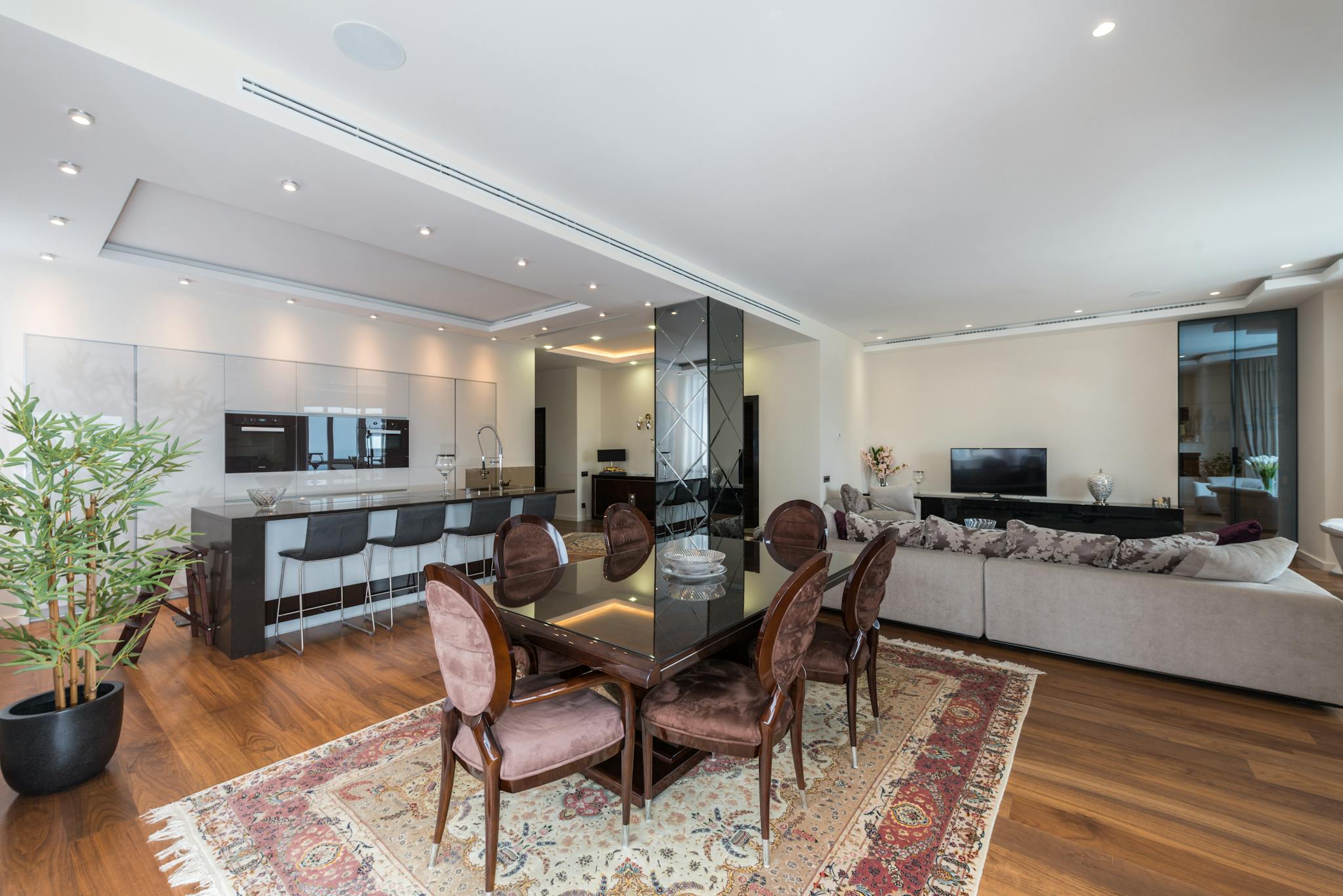 Bright and spacious living room featuring elegant decor and modern furnishings.